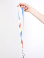 Load image into Gallery viewer, minimalist red, white, yellow and blue striped lanyard 
