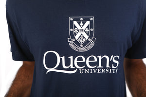 Close up of navy tshirt with white queens crest
