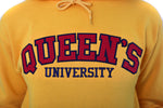 Load image into Gallery viewer, Close up of red Queen&#39;s logo on yellow sweater
