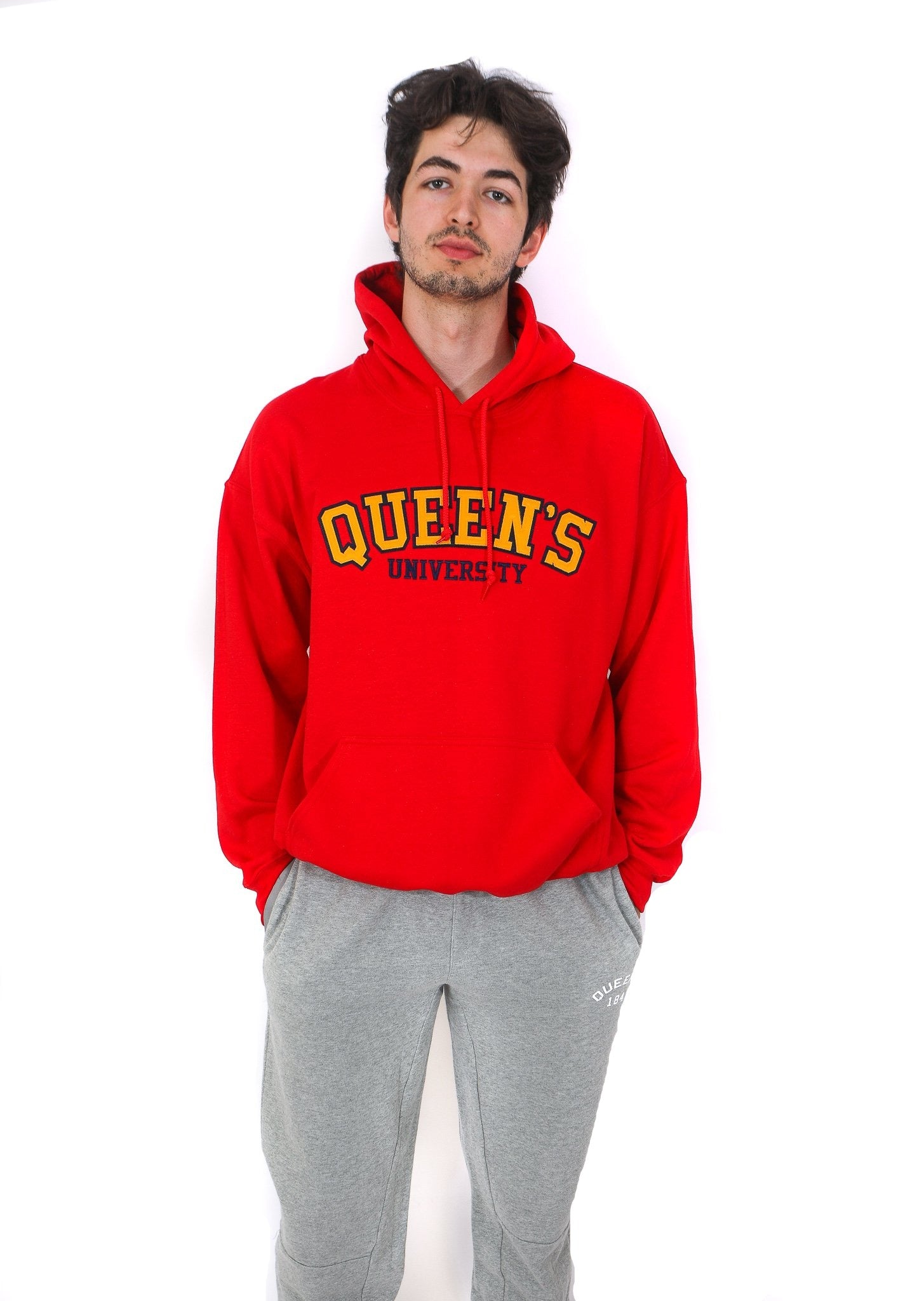 Front view of red hoodie with yellow Queen's logo